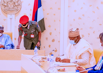 Buhari Swears In Two INEC Commissioners