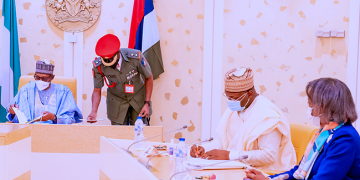 Buhari Swears In Two INEC Commissioners