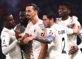 AC Milan beats nine-man Bologna to move top of Serie A