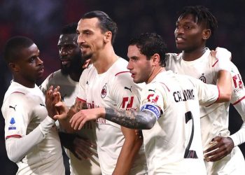 AC Milan beats nine-man Bologna to move top of Serie A