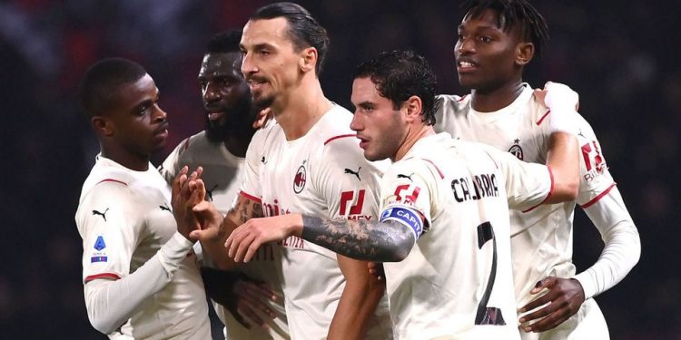 AC Milan beats nine-man Bologna to move top of Serie A