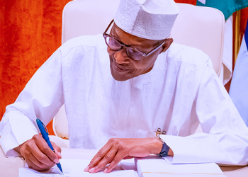 Buhari Signs Climate Change, AMCON Bills into Law