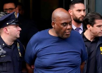 Police apprehends New York subway train attacker.