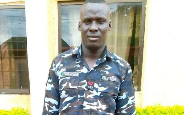 Police demotes officer for praising cult group