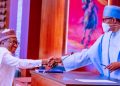 Buhari Swears in New RMAFC Chairman
