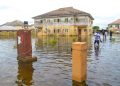Buhari Blames the Recent Flooding on Building on Water Channels